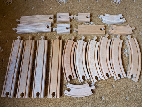 Wooden train track pieces - train,