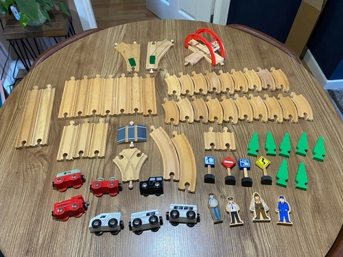 Wooden train track pieces - 63,